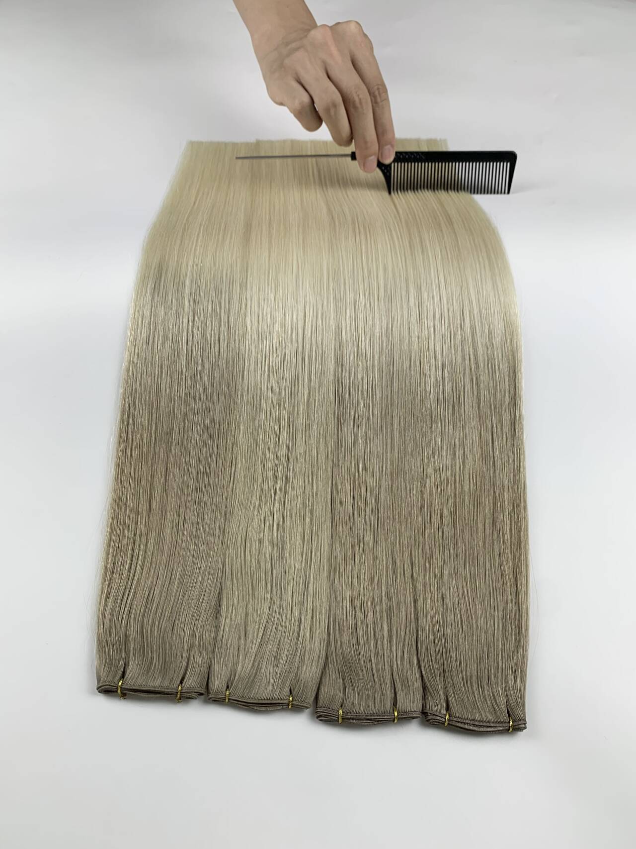 Detailed inspection of hair during manufacturing